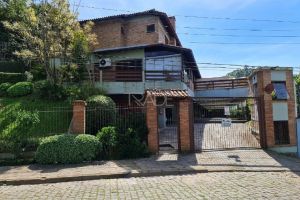 Casa em Condomínio com 258m², 3 dormitórios, 1 suíte, 2 vagas, no bairro Jardim Isabel em Porto Alegre